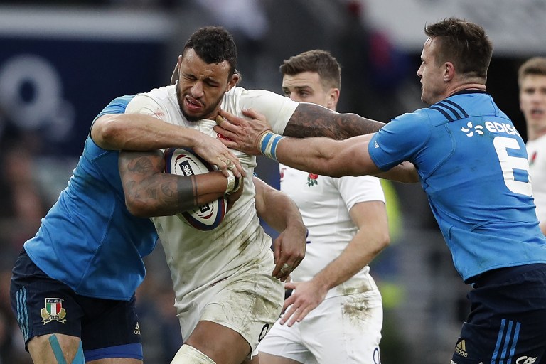 Les Anglais ont été malmenés une heure par une solide défense italienne (Adrian Dennis / AFP).