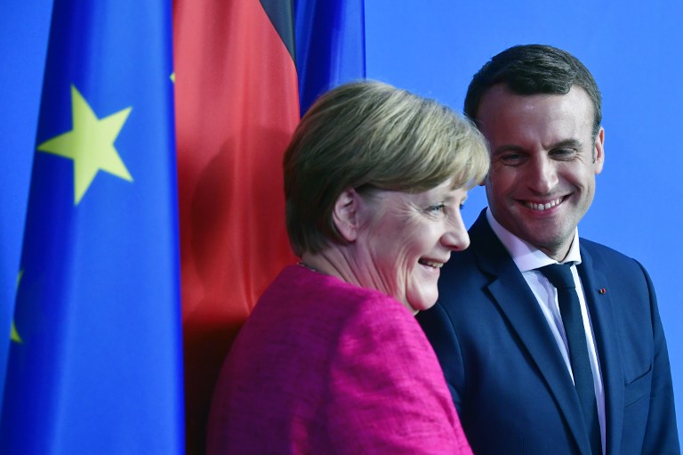Angela Merkel et Emmanuel Macron (©JOHN MACDOUGALL - AFP)