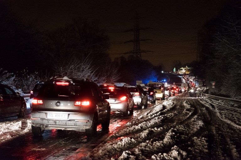 La neige a causé de sérieuses perturbations sur les routes (©SAMUEL BOIVIN - AFP)