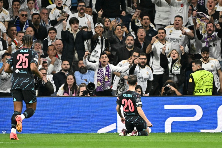 Le joueur de Manchester City Bernardo Silva après son but lors du quart de finale aller de Ligue des Champions contre le Real Madrid, le 9 avril 2024 au stade Bernabeu à Madrid