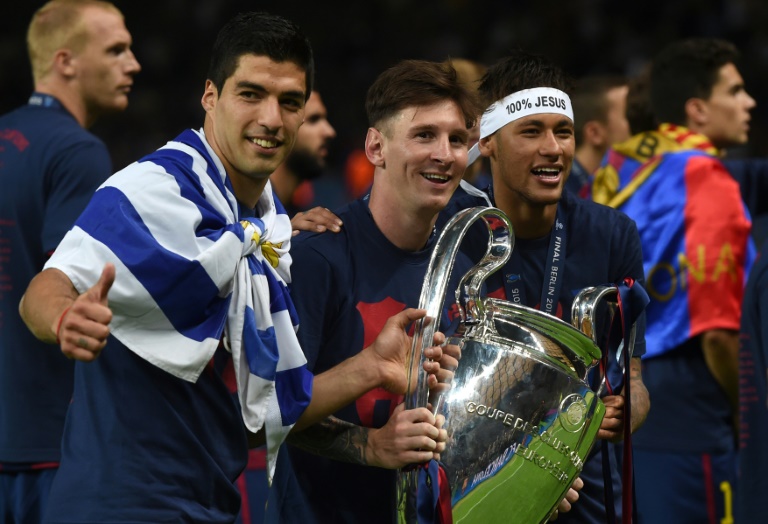 Luis Suarez, Lionel Messi et Neymar après leur victoire avec le FC Barcelone en finale de Ligue des champions contre la Juventus (3-1), le 6 juin 2015 à Berlin