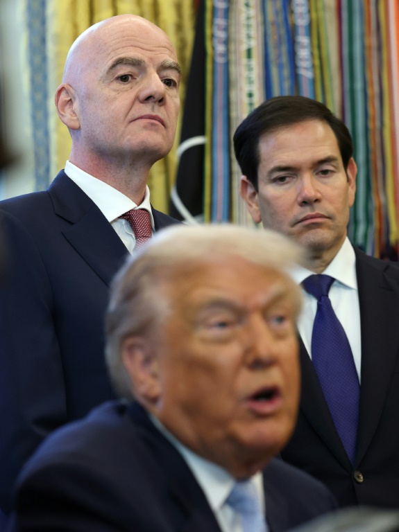 FIFA President Gianni Infantino (left) listens as US President Donald Trump speaks during a White House meeting last month