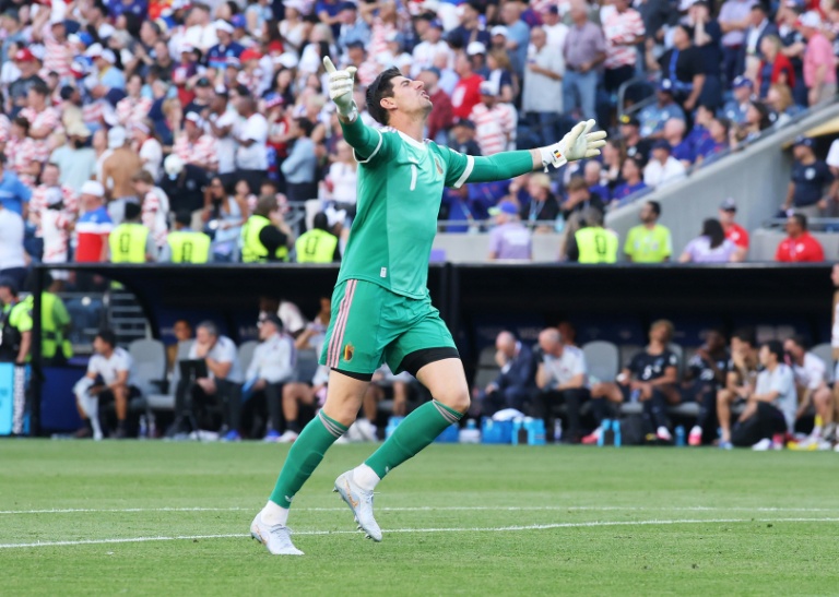 Thibaut Courtois célèbre après un match de la Coupe du Monde contre les États-Unis.